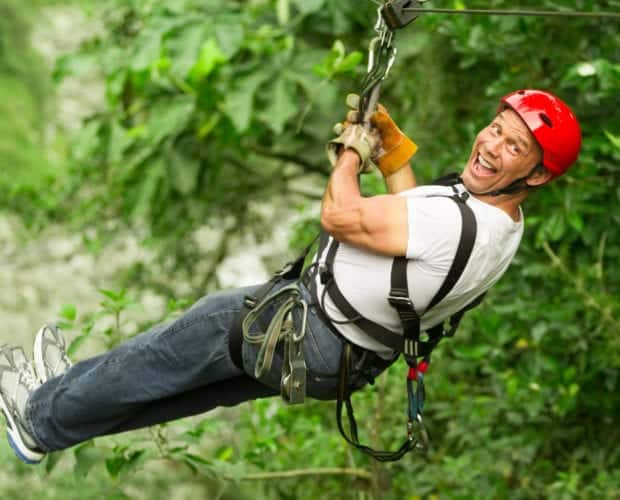 happy man ziplining
