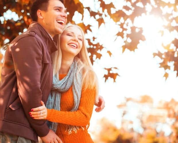 Romantic couple with the fall leaves