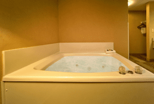 A Jacuzzi tub in the room of a Pigeon Forge hotel room.
