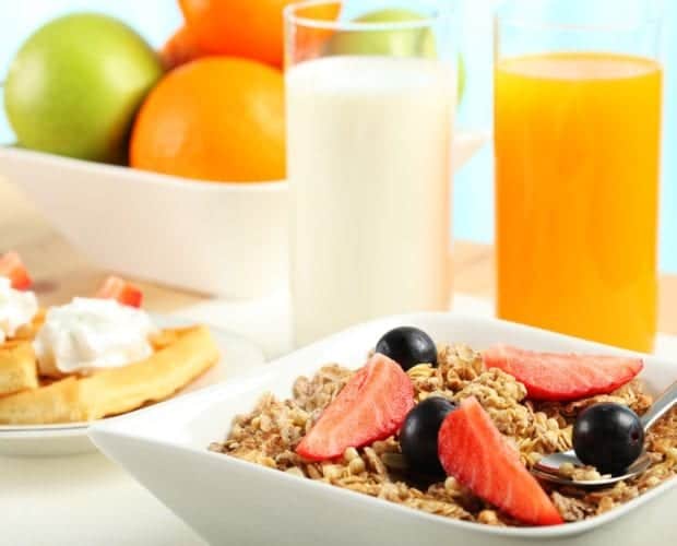 Oatmeal, orange juice, and milk for breakfast