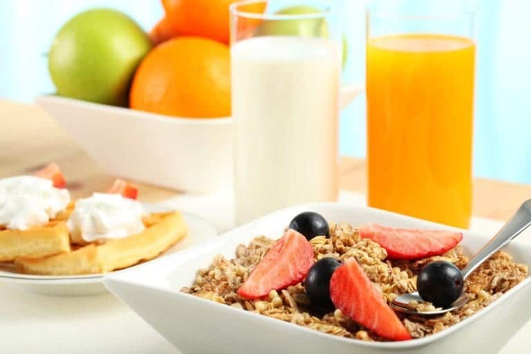 Oatmeal, orange juice, and milk for breakfast